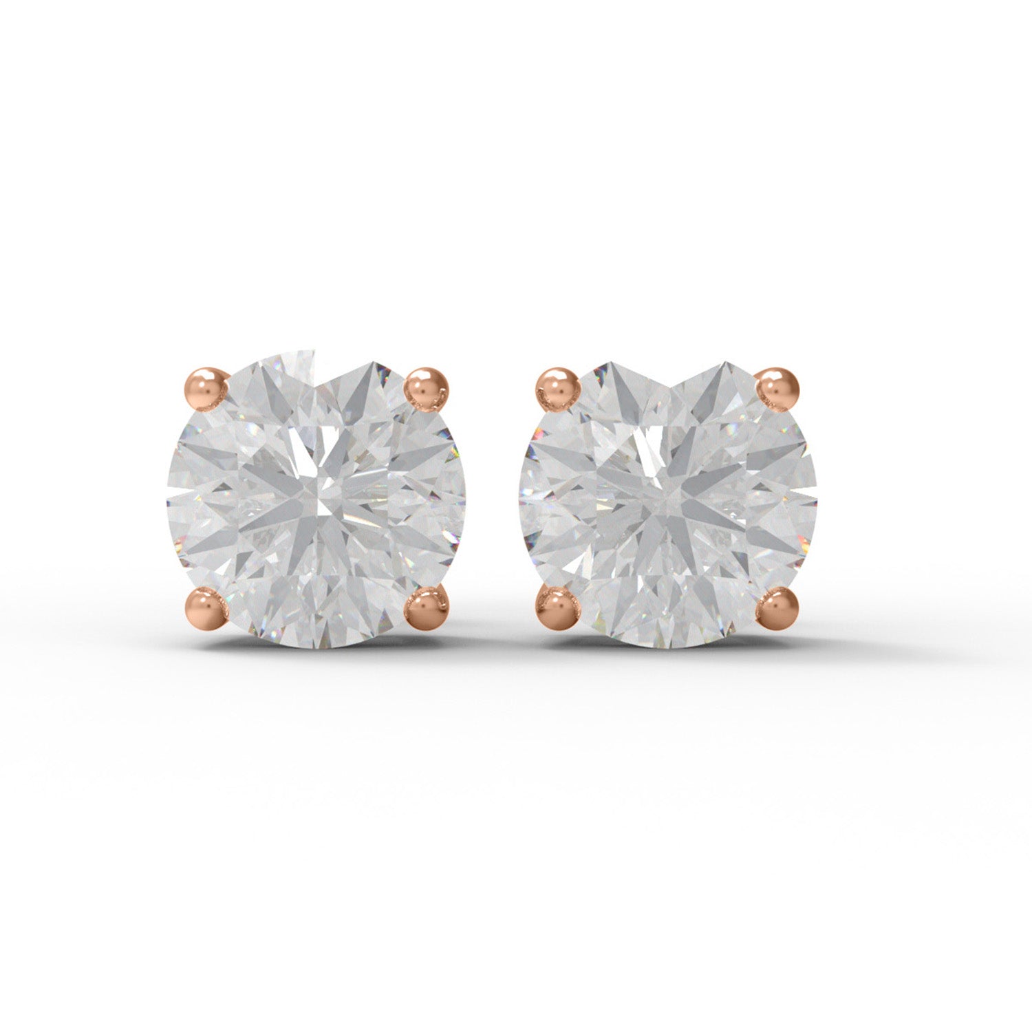 Pair of rose gold moissanite stud earrings on a white background