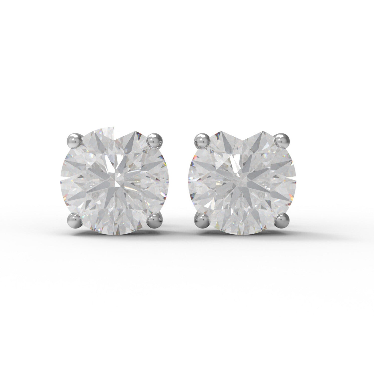 Pair of sterling silver moissanite stud earrings on a white background