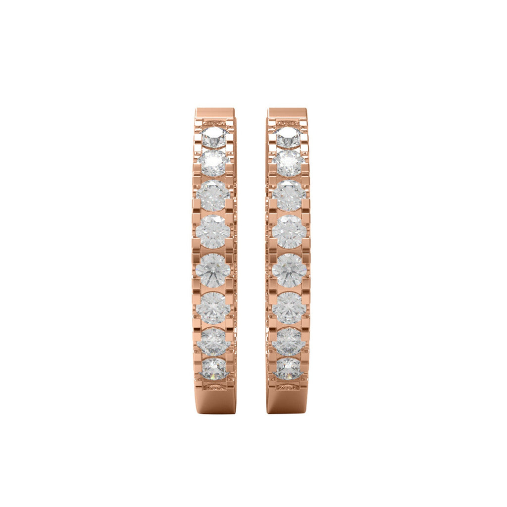 Rose gold in and out moissanite hoop earrings on a white background