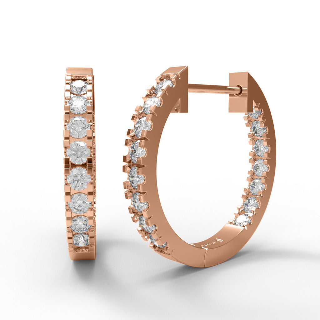 Rose gold in and out moissanite hoop earrings on a white background