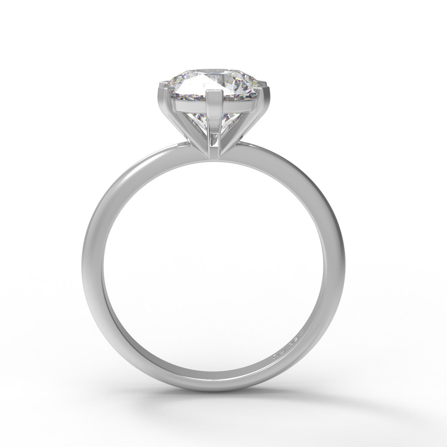 Round-cut sterling silver moissanite solitaire ring on a white background